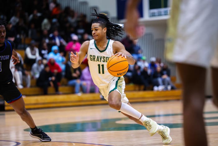 Grayson senior guard CJ Hyland drives to the basket during Tuesday night's 76-70 win over Newton. (Photo: Colin Hubbard)